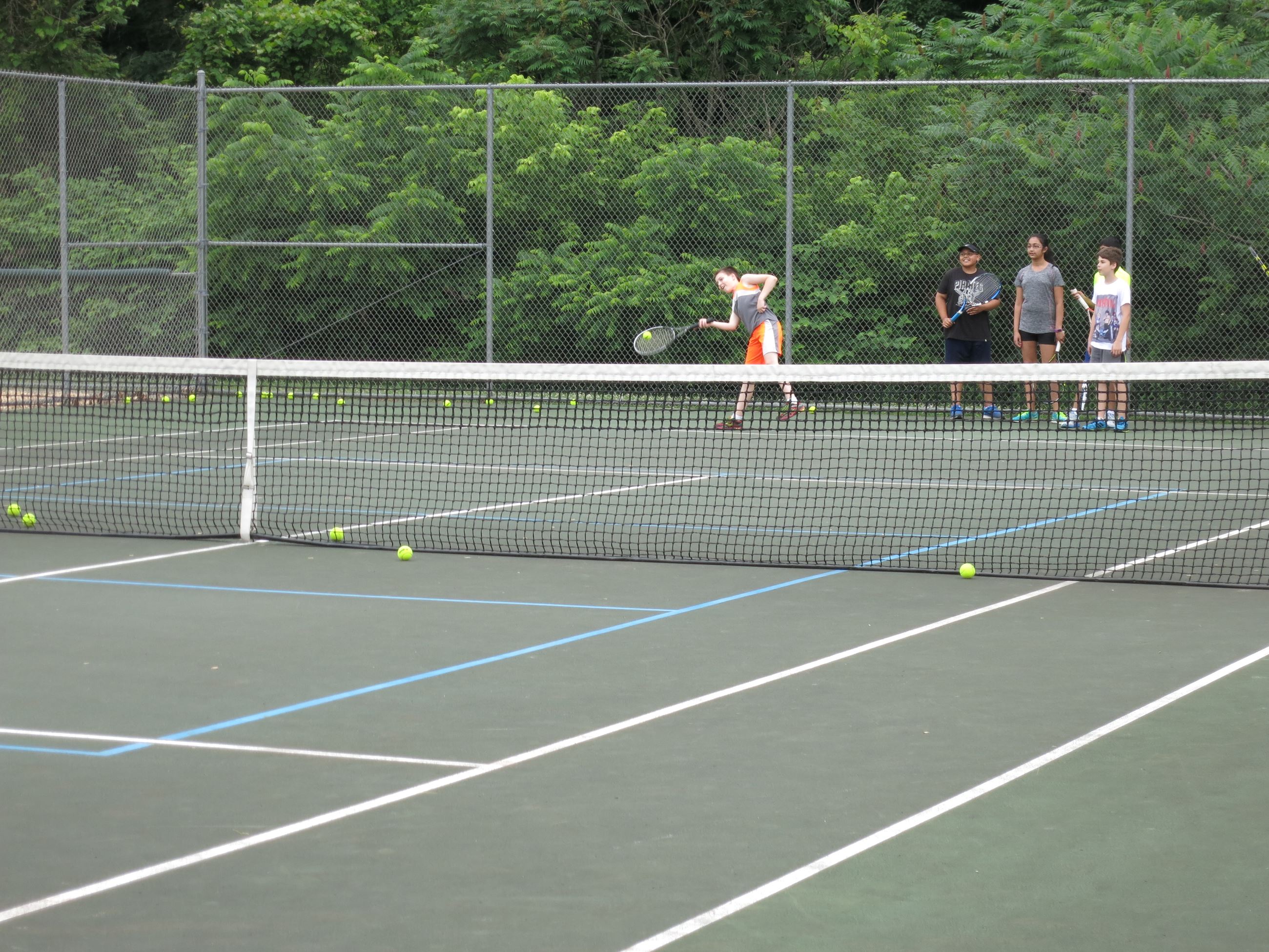 kids playing tennis - outdoor court 2