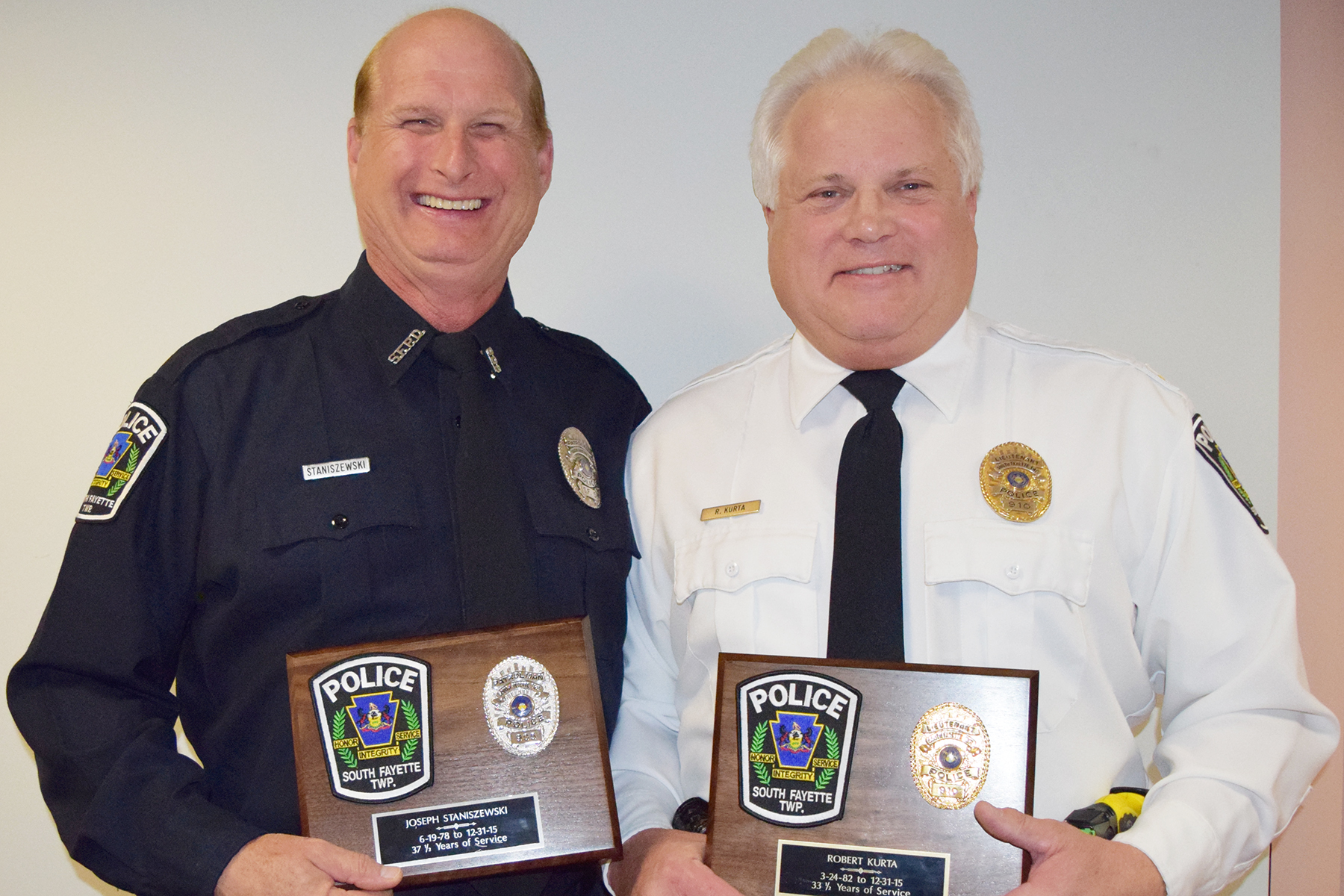 Police retirees Joe Staniszewski and Bob Kurta